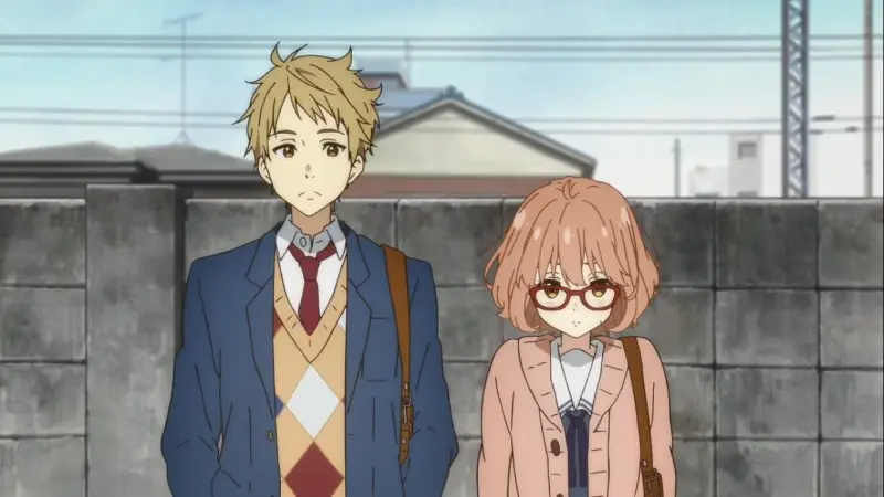 Mirai Kuriyama wearing her red glasses walks alongside Akihito Kanbara outdoors in the supernatural action series Beyond the Boundary.