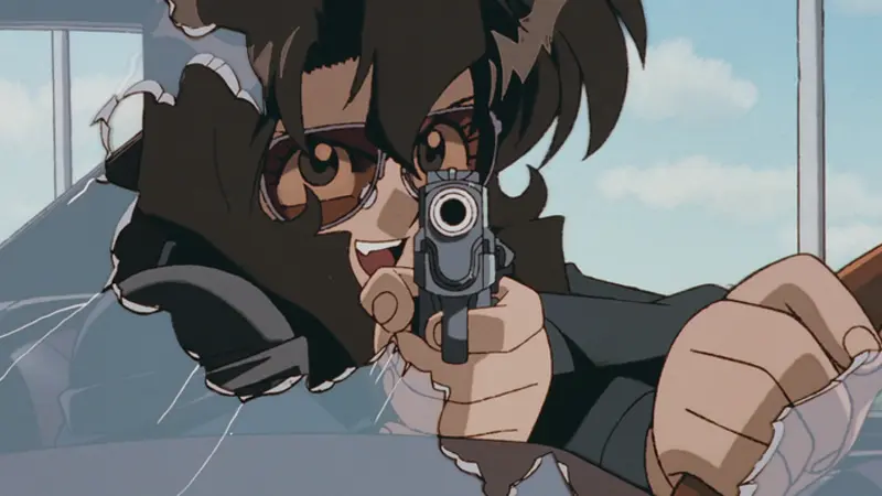 Gunsmith Cats features Rally Vincent aiming her sidearm through a shattered windshield, a classic gun fu anime.
