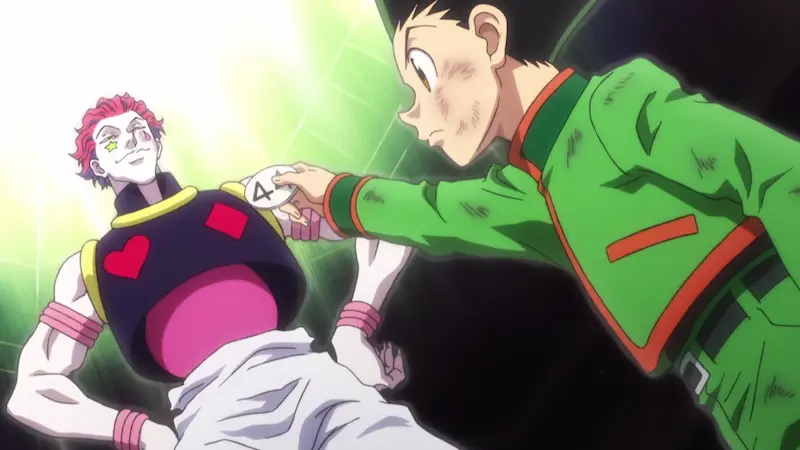 Gon Freecss and Hisoka Morow facing each other in Heaven's Arena in Hunter x Hunter.
