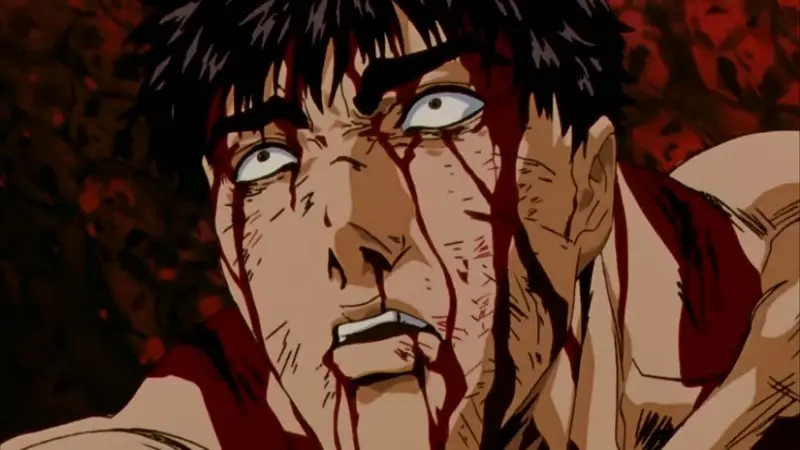 A battered and exhausted Guts stares blankly upward with blood streaming down his face and torso in the grim dark fantasy Berserk.