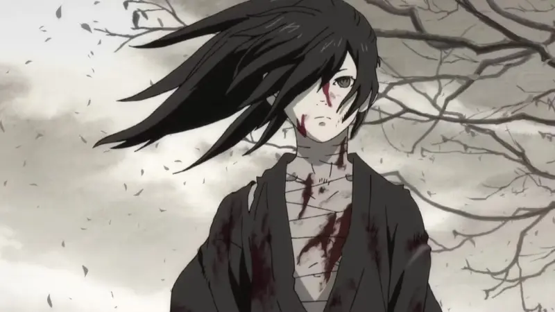 A heavily bandaged Hyakkimaru stands silently as the wind blows his dark hair across his bruised, bloody face in the dark fantasy anime Dororo.