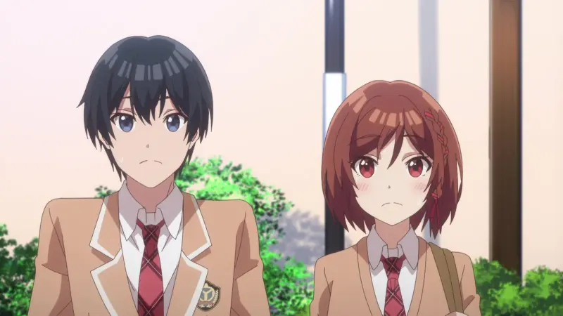 Saito and a blushing Akane stand awkwardly side-by-side outdoors wearing their tan high school uniforms.