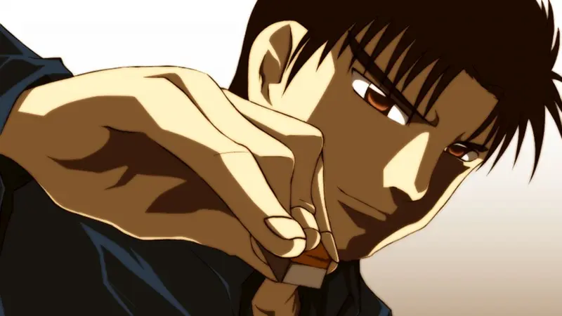 Tetsuya Asada smirking while strategically holding a mahjong tile up to the light.
