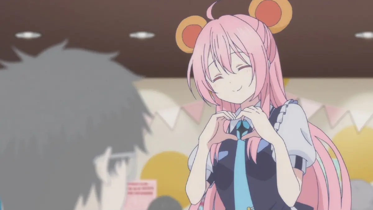 Satou Matsuzaka forms a heart shape with her hands inside a bright cafe setting in the anime Happy Sugar Life.