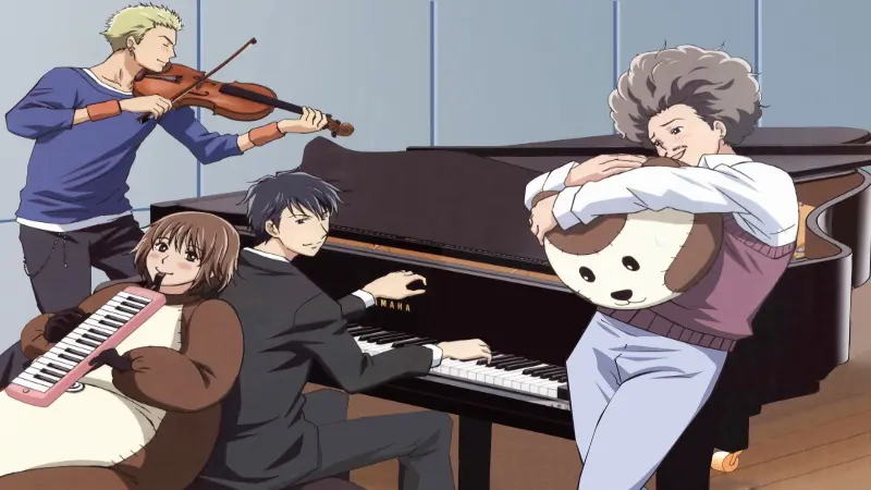Chiaki playing the grand piano while Nodame wears a giant mongoose suit alongside their fellow orchestra members.