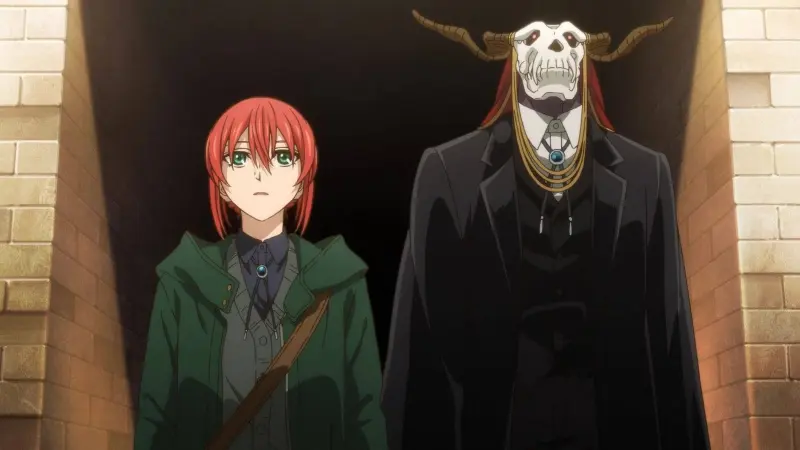 Chise Hatori walking beside the skull-headed Elias Ainsworth out of a stone archway in The Ancient Magus' Bride.