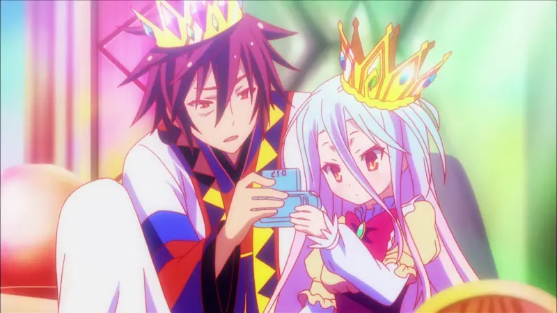 The undefeated genius gamer siblings Sora and Shiro wear crowns while playing a handheld console in the isekai anime No Game No Life.