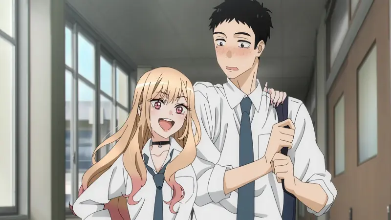 Marin Kitagawa smiling widely while grabbing the arm of a flustered Wakana Gojo in a school hallway in My Dress-Up Darling.