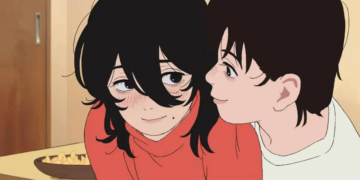 Ayumu Fujino and Kyomoto sit closely together at a drawing desk in the anime movie Look Back.