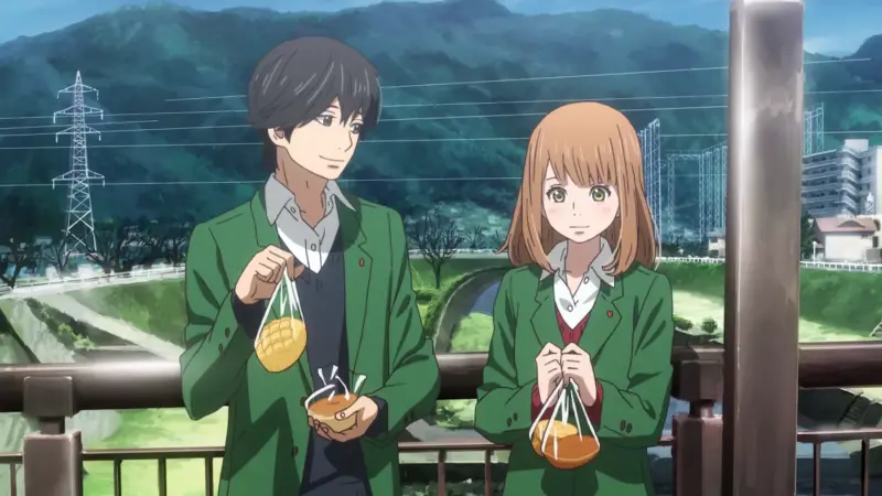 Kakeru and Naho smiling while holding melon bread and standing on a bridge in the sad romance anime Orange.