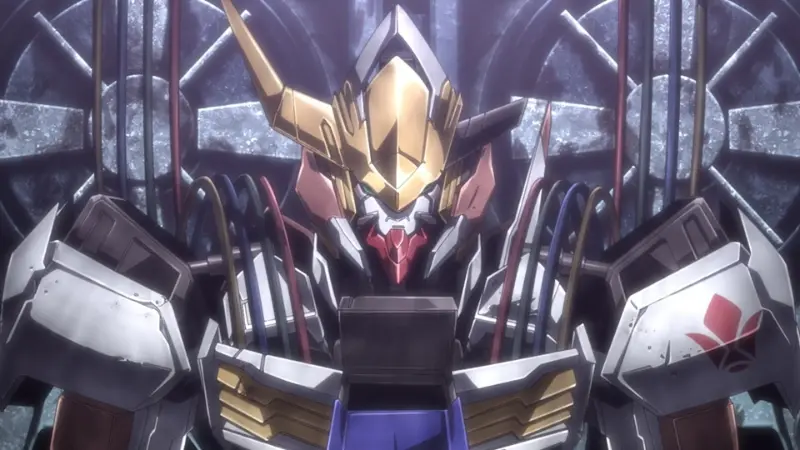 The Gundam Barbatos undergoing maintenance in a dimly lit hangar in Mobile Suit Gundam: Iron-Blooded Orphans.