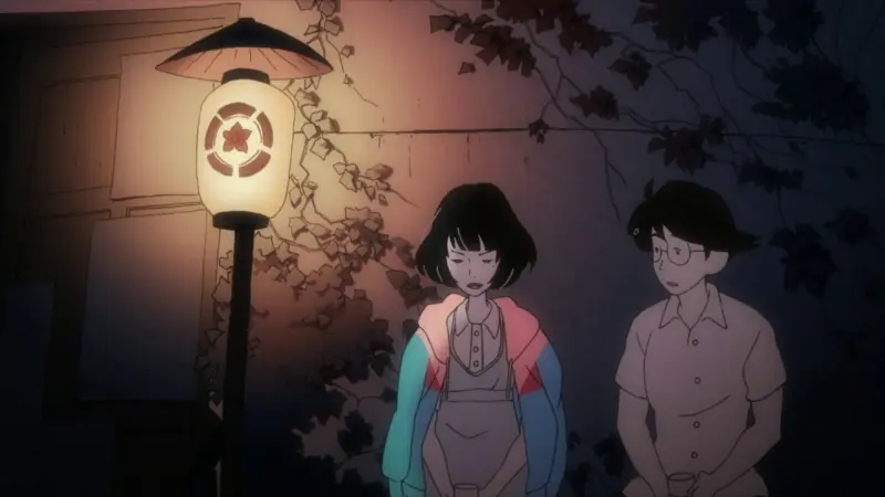 The protagonist Watashi and Akashi stand beneath a glowing lantern in the surreal 1-season anime The Tatami Galaxy.