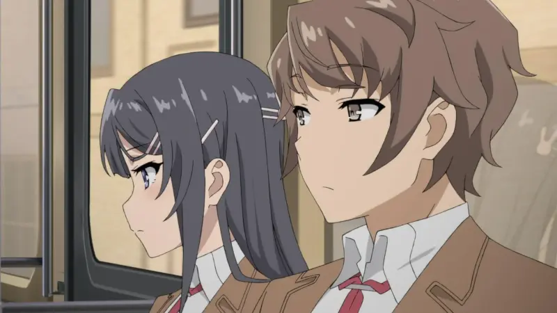 Sakuta and Mai sitting next to each other on a train in the supernatural romance anime Rascal Does Not Dream of Bunny Girl Senpai.