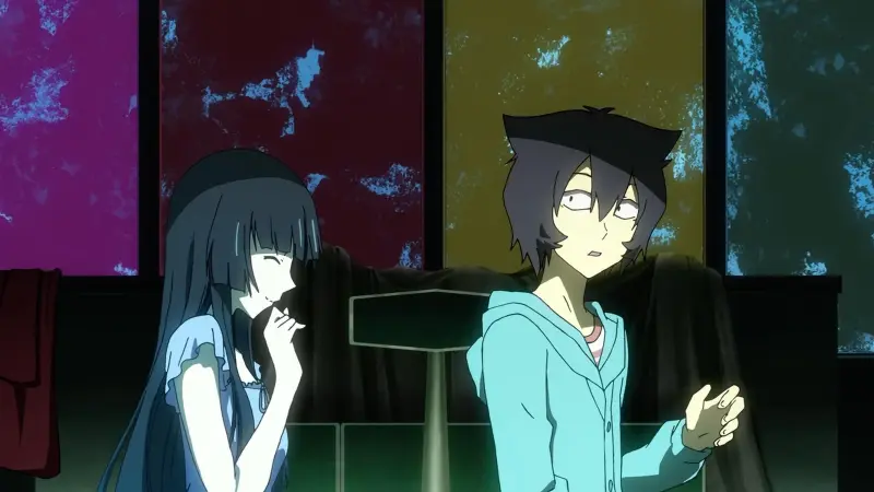 Rea smiling next to a startled Chihiro in a dimly lit room in Sankarea: Undying Love.