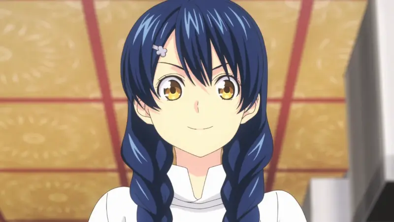 Food Wars! chef Megumi Tadokoro smiling brightly in her white culinary uniform.