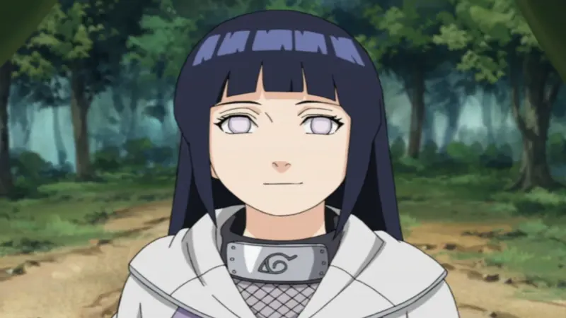 Naruto character Hinata Hyuga wearing her white jacket and smiling gently in a green forest.