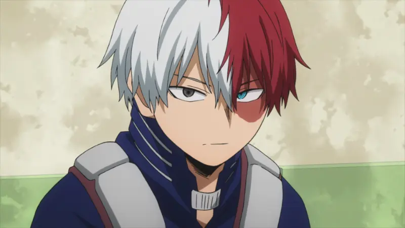 My Hero Academia student Shoto Todoroki looking serious while wearing his hero costume.