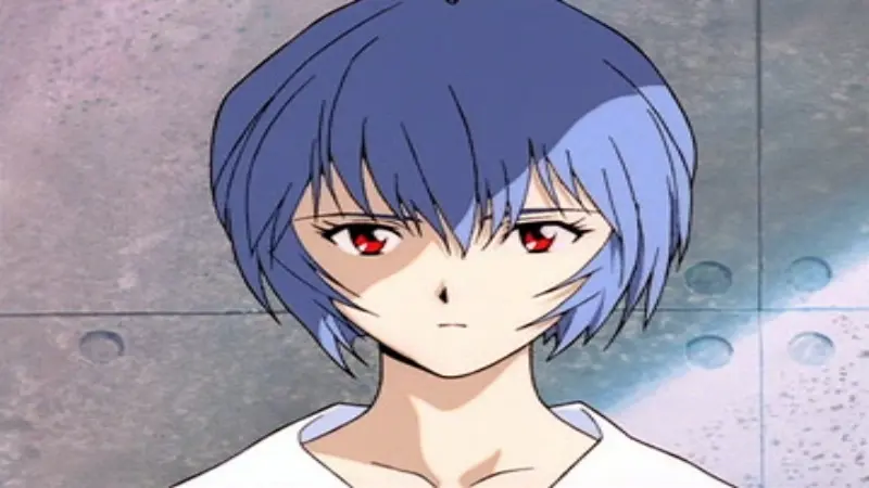 Neon Genesis Evangelion pilot Rei Ayanami delivering a classic blank stare, defining the archetype for the best kuudere anime characters.