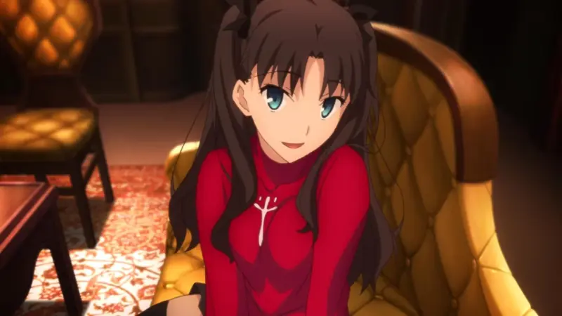 Fate/stay night character Rin Tohsaka smiling while sitting on a yellow tufted chair, a classic entry among the best tsundere anime characters.