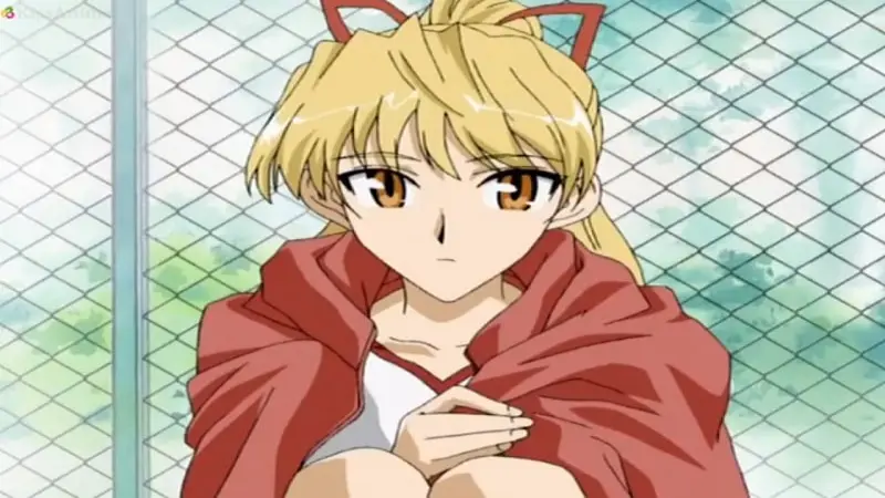 School Rumble character Eri Sawachika pulling her red jacket tightly around her shoulders.