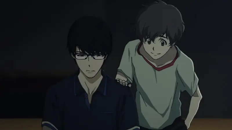 Nine sits with a serious, focused expression wearing glasses while Twelve smiles playfully over his shoulder in Terror in Resonance.