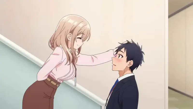 Shiori Katase smiles warmly while giving a gentle headpat to a heavily blushing Takuma Shinozaki on a modern office staircase.